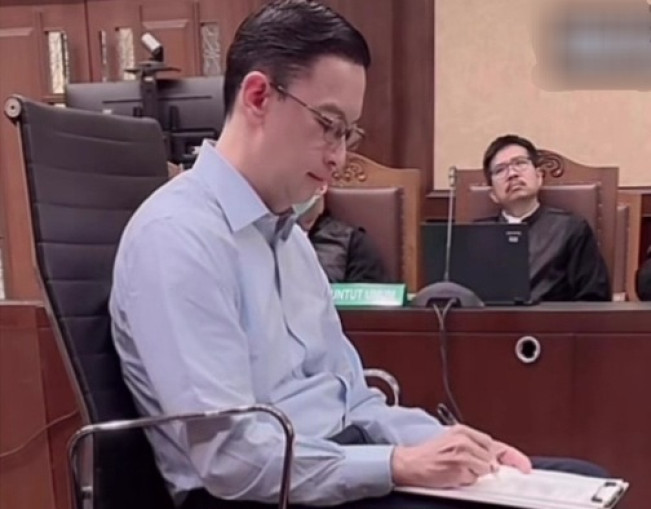 Menteri Perdagangan periode 2015-2016 Thomas Trikasih Lembong atau Tom Lembong saat jalani sidang. [Instagram]